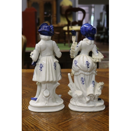 1618 - Pair of decorative porcelain male & female figures, each approx 17cm H (2)