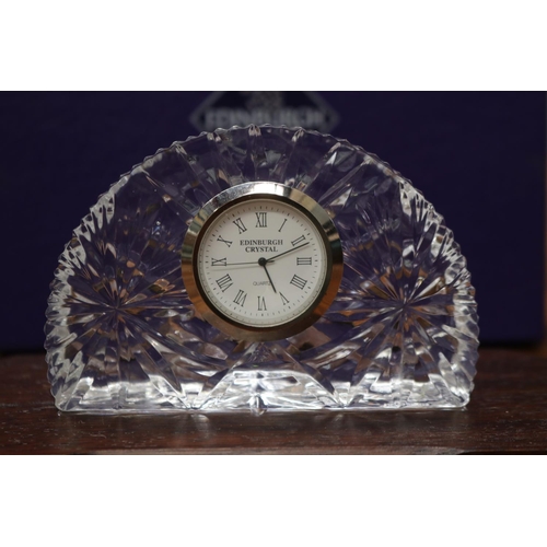 1623 - Boxed Edinburgh crystal clock, unknown working order, face is loose, approx 9cm H (including stand) ... 