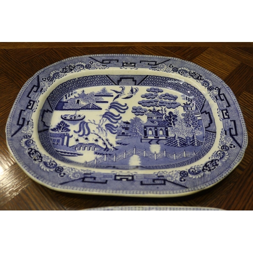 1637 - Antique Staffordshire blue and white Willow pattern platters along with a comport, approx 40cm x 32c... 