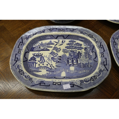 1637 - Antique Staffordshire blue and white Willow pattern platters along with a comport, approx 40cm x 32c... 