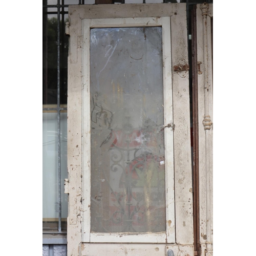 1782 - Pair of antique French entry doors, scrolling wrought iron panels to each, each approx 212cm H and a... 