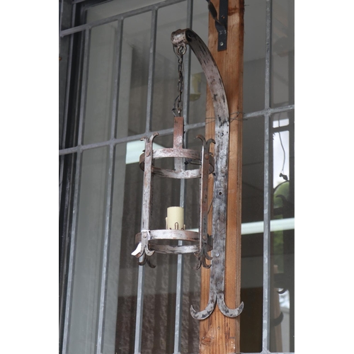 1800 - Wrought iron lantern on bracket, approx 65cm H