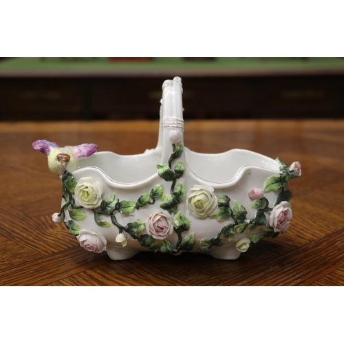 1641 - German porcelain basket with bird, approx 15cm H x 22cm W x 13cm D