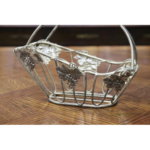 1644 - Metal wine holder, with applied grape motif, approx 18cm H x 25cm W x 13cm D