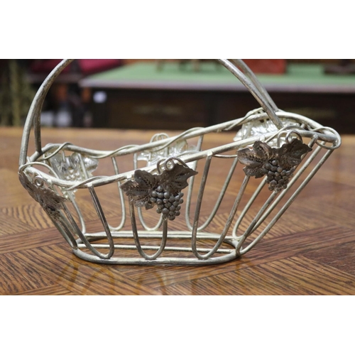 1644 - Metal wine holder, with applied grape motif, approx 18cm H x 25cm W x 13cm D