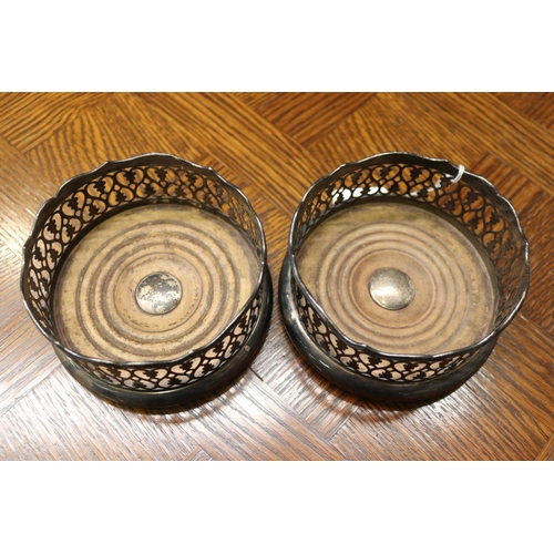 1648 - Pair of pierced wine coasters, unmarked, each approx 6cm H x 13cm Dia  (2)