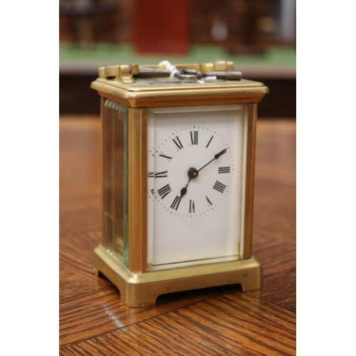 1649 - Antique brass cased carriage clock, has key, unknown working condition, approx 12cm H (excluding han... 