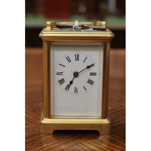 1649 - Antique brass cased carriage clock, has key, unknown working condition, approx 12cm H (excluding han... 