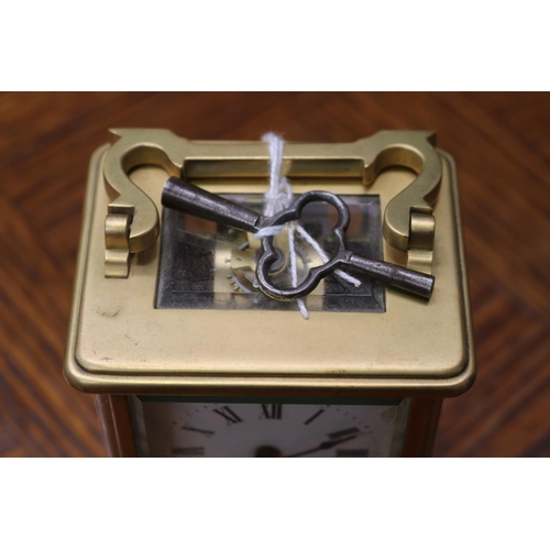 1649 - Antique brass cased carriage clock, has key, unknown working condition, approx 12cm H (excluding han... 