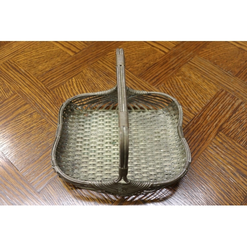 1668 - Decorative plated woven basket, approx 14cm H (including handle) x 20cm W x 17cm D