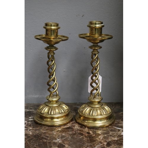 1690 - Pair of heavy brass twist candlesticks, each approx 21cm H (2)