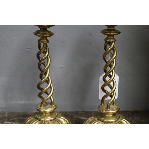 1690 - Pair of heavy brass twist candlesticks, each approx 21cm H (2)