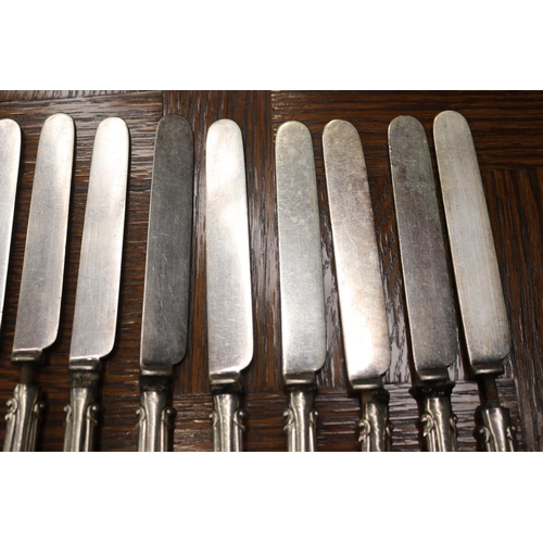 1701 - Set of twelve silver handled knives, various conditions