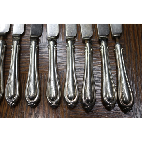 1701 - Set of twelve silver handled knives, various conditions