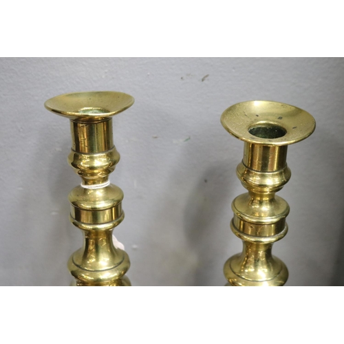 1702 - Pair of antique brass candlesticks, each approx 22cm H  (2)