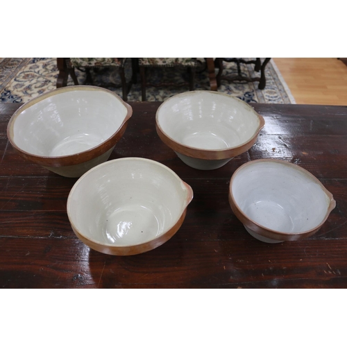 1122 - Set of four French earthenware mixing bowls, approx 14cm H x 30cm Dia and smaller (4)