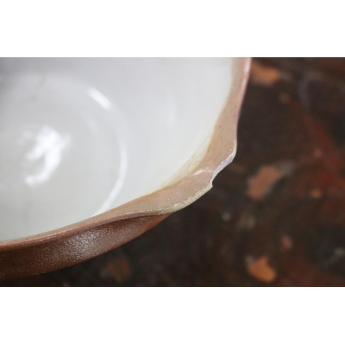 1122 - Set of four French earthenware mixing bowls, approx 14cm H x 30cm Dia and smaller (4)