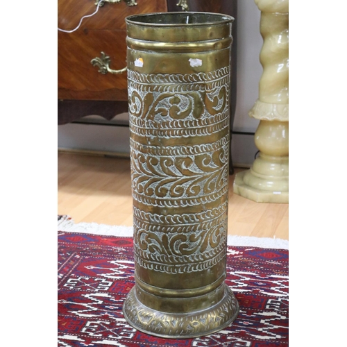 1080 - Repousse brass cylinder umbrella stand, approx 64cm H