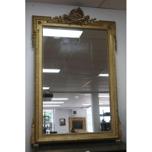 1086 - Fine antique 19th century French gilt surround salon mirror, elaborate crest with crossed torch and ... 