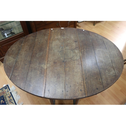 1144 - Antique English 18th century oak gateleg table, approx 73cm H x 115cm W x 148cm D (sides up)