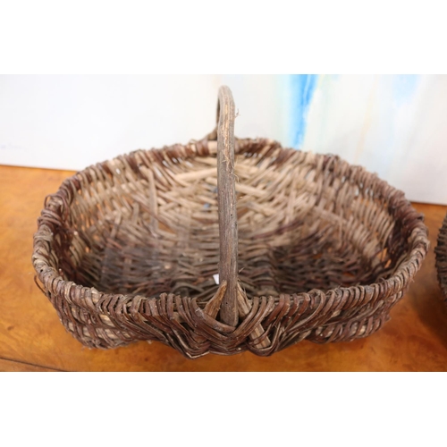 169 - Two French woven pickerts baskets, approx 24cm H (including handle) x 42cm W x 30cm D and smaller (2... 