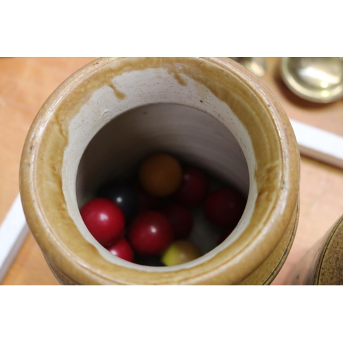 310 - Two antique stone bung lidded jars, each approx 23cm H (2)