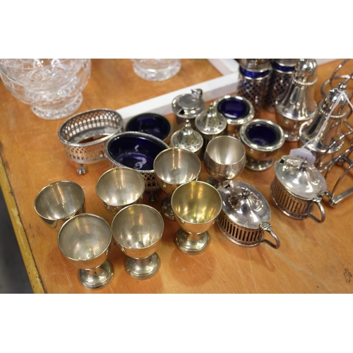 315 - Assortment of silver plate to include salts, sugar nips, jug etc, approx 18cm W and smaller