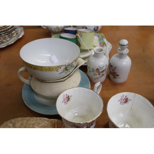 328 - Assortment of porcelain to include teapot, plates, cups, saucers, etc, approx 24cm W and smaller