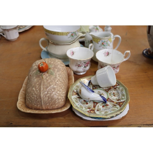 328 - Assortment of porcelain to include teapot, plates, cups, saucers, etc, approx 24cm W and smaller