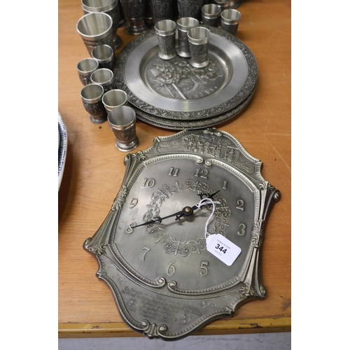 344 - Good assortment of pewter to include clock, tumblers, plates etc, approx 33cm H x 23cm W and smaller