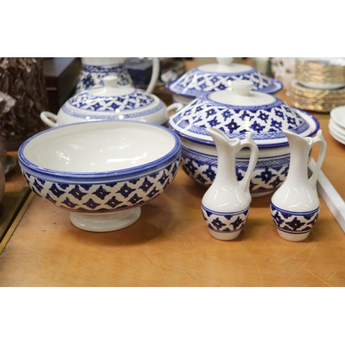 348 - Two blue and white lidded tureens and a jug etc, approx 22cm H and shorter (7)