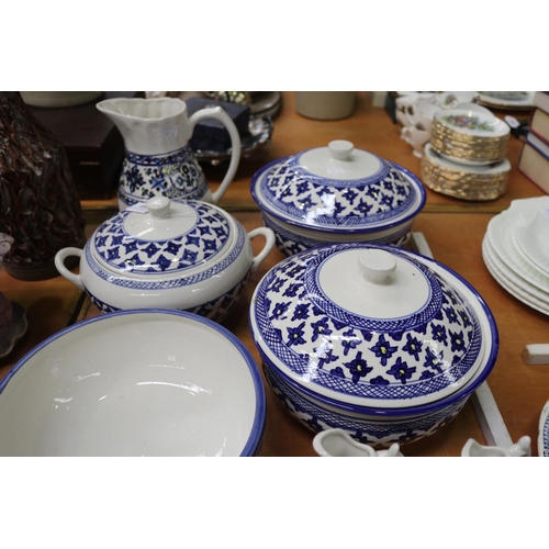 348 - Two blue and white lidded tureens and a jug etc, approx 22cm H and shorter (7)