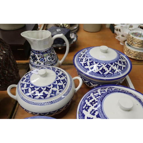 348 - Two blue and white lidded tureens and a jug etc, approx 22cm H and shorter (7)