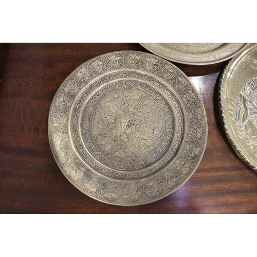 351 - Two Islamic brass trays and another, approx 28cm Dia and smaller (3)