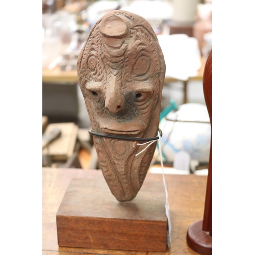 477 - Primitive mask statue with wooden bird figure, approx 39cm H and shorter (2)