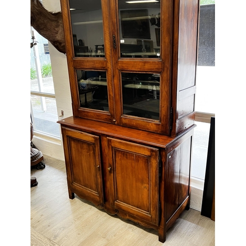 164 - Antique early 19th century French walnut two height buffet bookcase, shaped two section glazed top, ... 