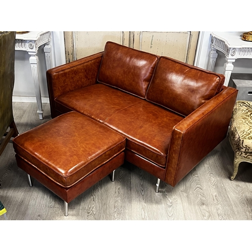194 - New unused vintage style as new brown faux  leather two seater sofa with leather footstool to match,... 