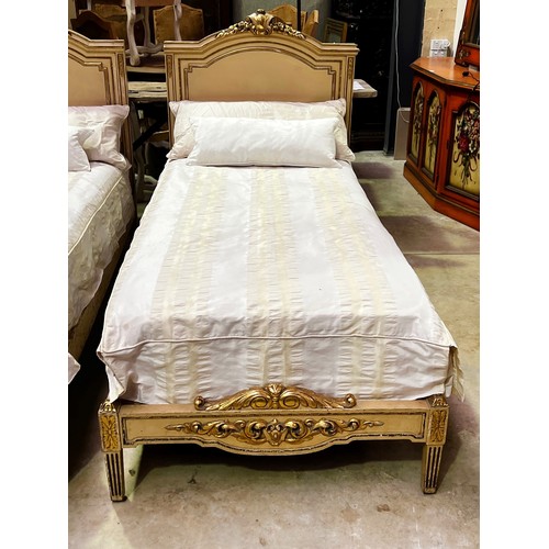 184 - Fine pair of antique French painted and gilt highlight single beds, standing on stop fluted tapering... 