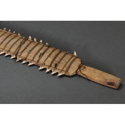5 - Fine Large Kiribati Islands Shark-tooth Ceremonial Sword, Micronesia. Palm-wood, palm leaf, shark te... 