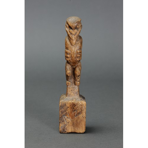 10 - Early Maori Figure on post, New Zealand. Carved and engraved wood. Delicately carved in an early tik... 