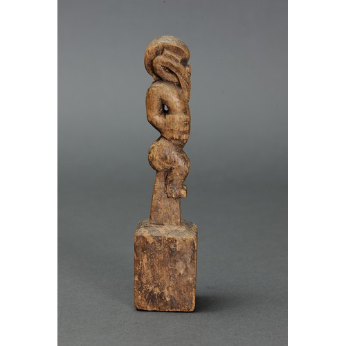 10 - Early Maori Figure on post, New Zealand. Carved and engraved wood. Delicately carved in an early tik... 