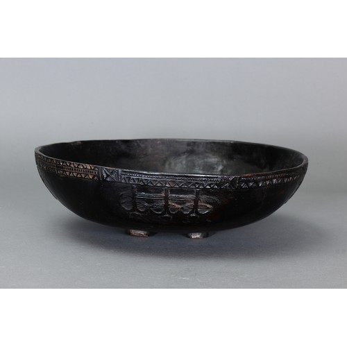 21 - Early Admiralty Island Bowl with stylized human figures and pattern around lip edge, Papua New Guine... 