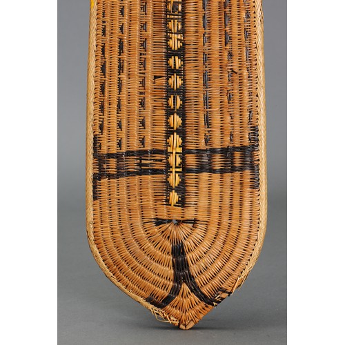 38 - Superb early Wicker War / Dance Shield, Solomon Islands. Woven natural fibre and natural pigment. Pu... 
