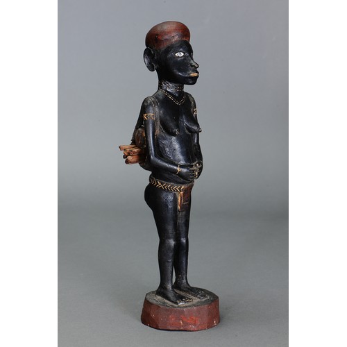 41 - Fine Pair of Bougainville Province Figures, Solomon Islands. Carved and engraved hardwood and natura... 