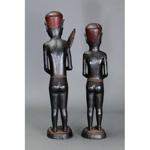 42 - Fine Pair of Bougainville Province Figures, Solomon Islands. Carved and engraved hardwood and natura... 