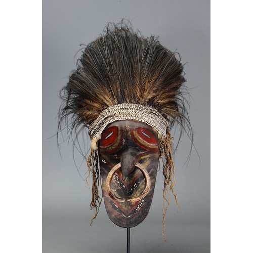 49 - Superb Barag Mask, East Sepik Province, Papua new Guinea. Carved hardwood, boar tusk, cassowary feat... 