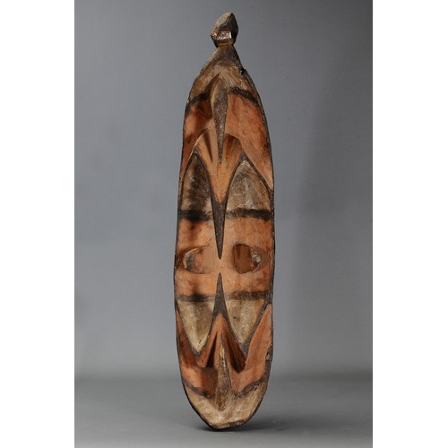 51 - Early deeply carved Hunstein Mountain Bahinemo Mask, Papua New Guiinea. Carved and engraved hardwood... 