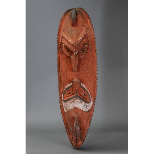99 - Lower Sepik Mask with dual facing faces, Papua New Guinea. Carved and engraved hardwood and natural ... 