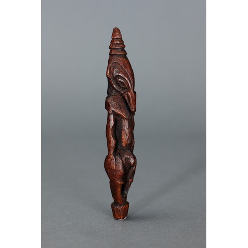 56 - Fine and small Ramu Amulet, Papua New Guinea. Carved and engraved hardwood. Diminutive in size, this... 