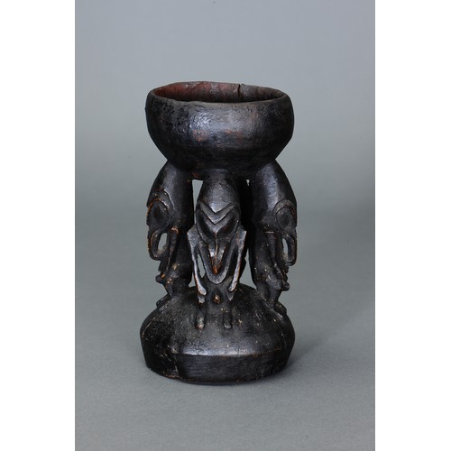 57 - Fine Lower Sepik Betlenut Mortar, Papua new Guinea. Carved and engraved hardwood. Early-Mid 20thC mo... 